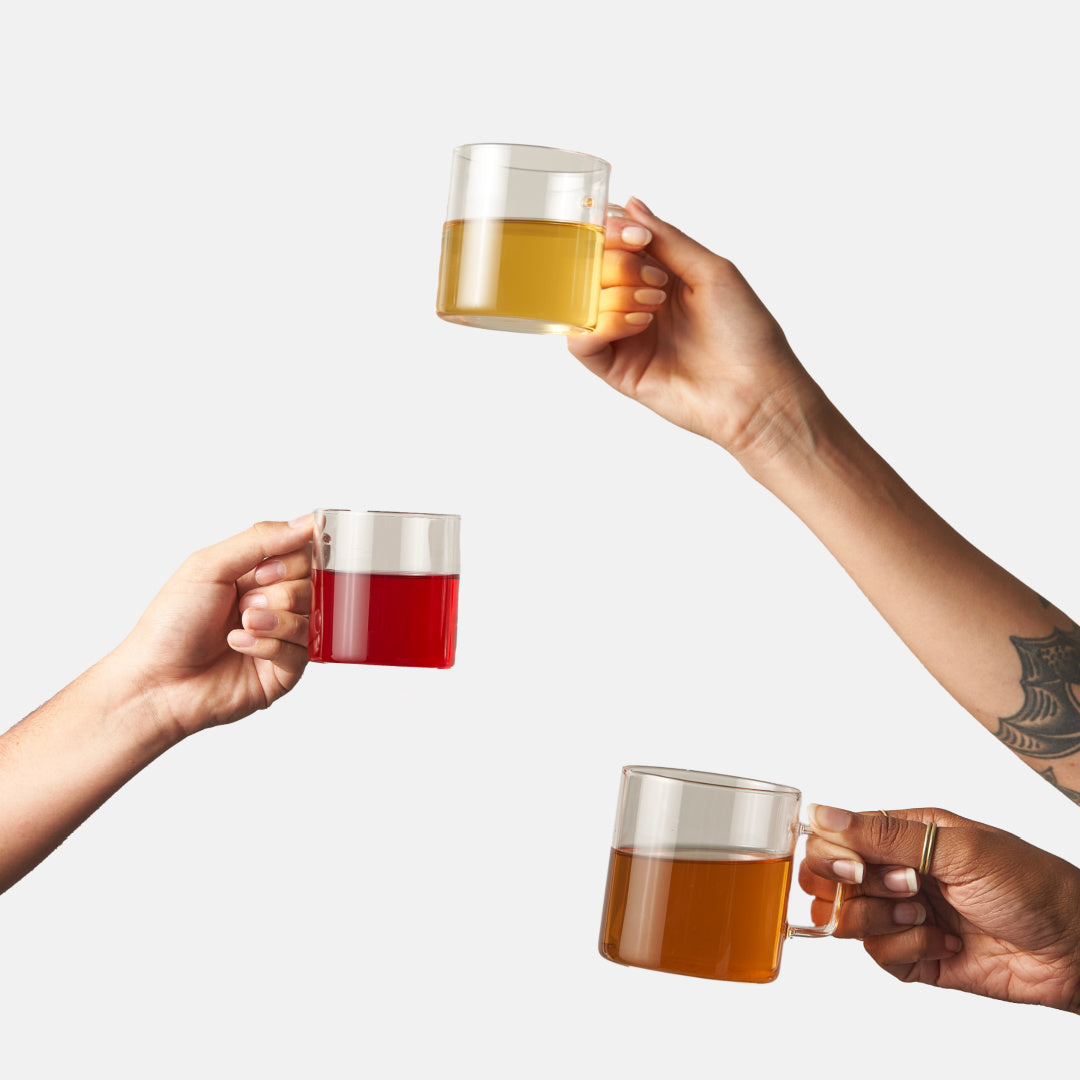 Three brewed Big Heart Tea blends in glass cups